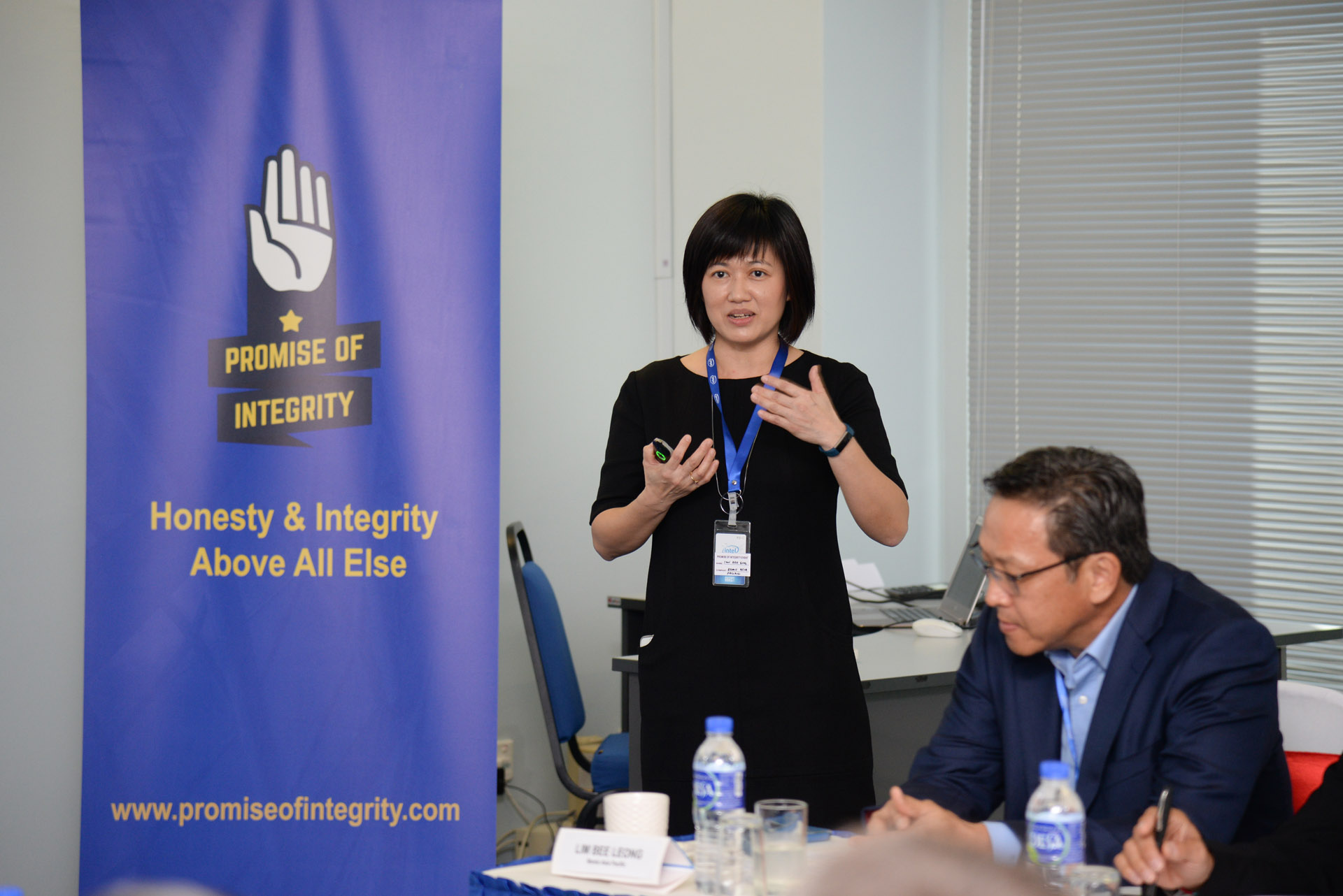 Ms Tan Bee Eng (Bemis Asia Pacific), co-lead of the Promise of Integrity Supplier Work Group giving a presentation during the Executive Dialogue